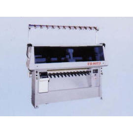 Computerized flat knitting machine