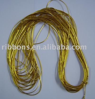 shiny metallic gold elastic cord put up on roll 500 yards (la corde é)