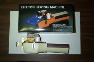 Hand Held Sewing Machine (Hand Held Machine à coudre)